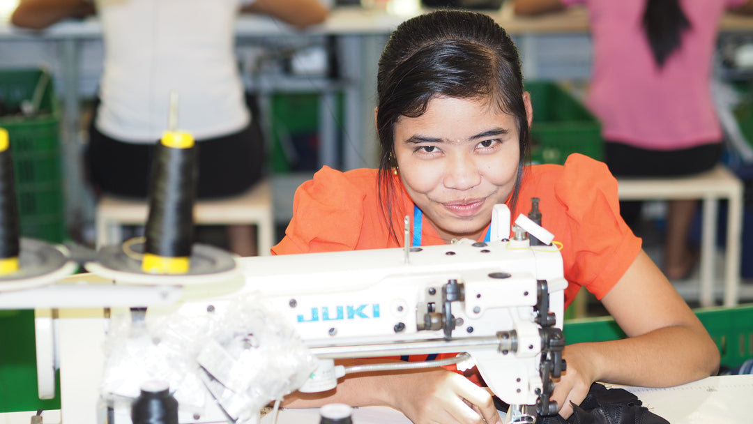 Takashima employee at sewing machine