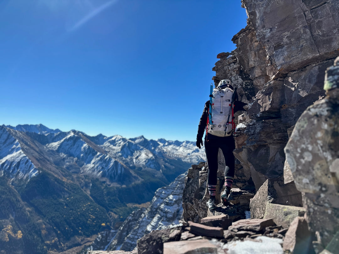 Hanna walking on a ledge