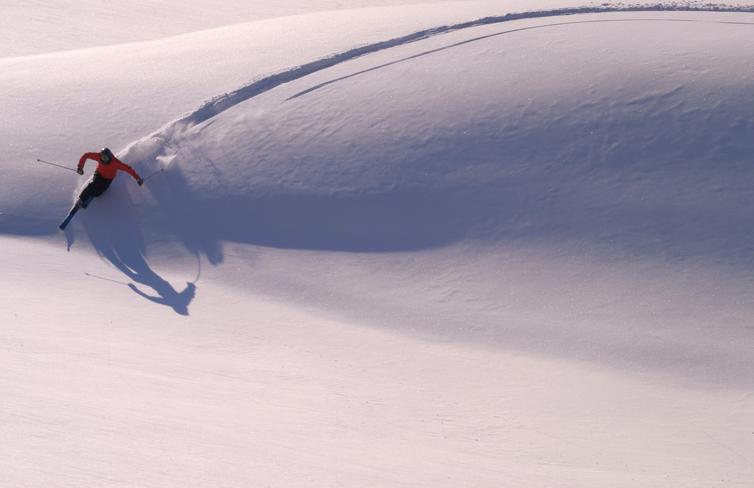 skier making a large turn